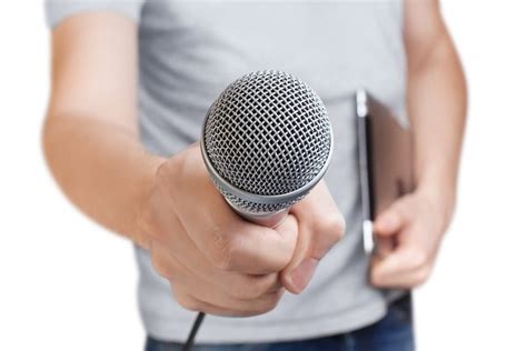 Shutterstock261065645 Young Man Holding A Microphone Isolated On White Background