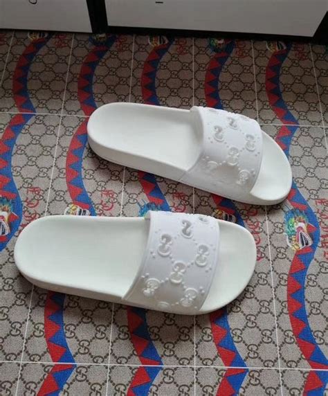 Gucci Unisex Rubber Gg Slide Sandal White Alimorluxury