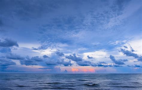 Pink Clouds Over An Ocean Sunset Stockfreedom Premium Stock Photography