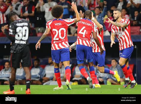 Atletico Players Celebrate During Champions League Match Day Between