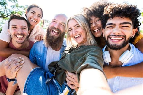 Premium Photo Multiracial Young People Taking Selfie Outside