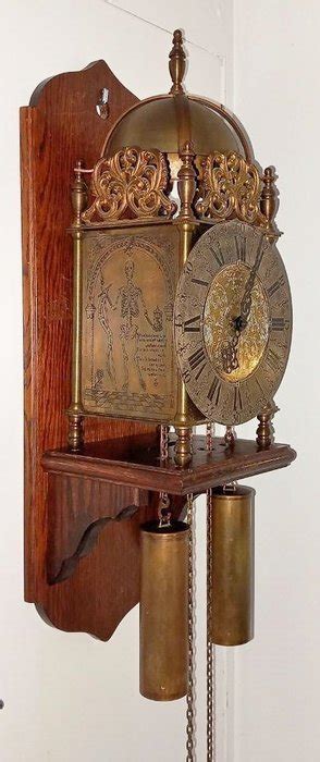 Lantern clock - John Smith London - Brass, Bronze, Oak wood - Catawiki