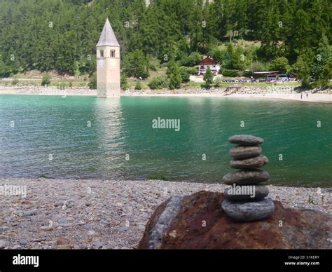 Bell tower in the Lake Resia - Lago di Resia - Reschensee, South Tyrol, Italy Stock Photo - Alamy