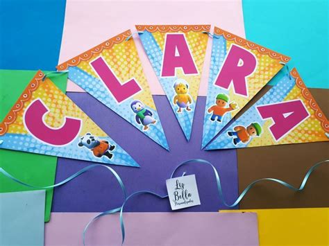 A Colorful Background With Paper Cut Out To Spell Out The Word Clar On It