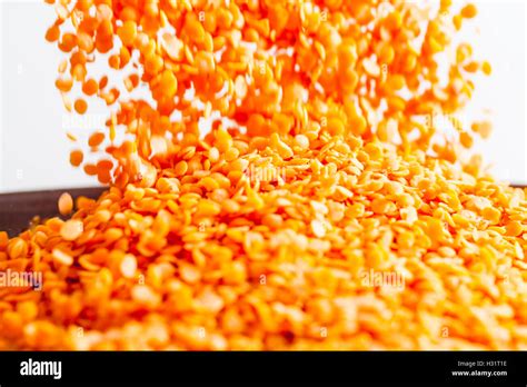 Dried Red Lentils Falling Stock Photo Alamy