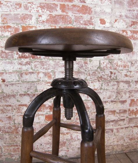 Vintage Industrial Wood And Cast Iron Adjustable Drafting Stool At