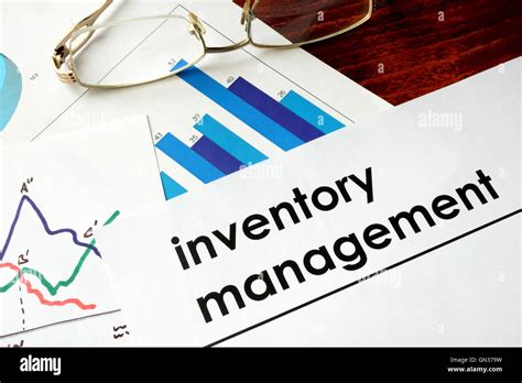 Paper With Words Inventory Management And Charts Stock Photo Alamy