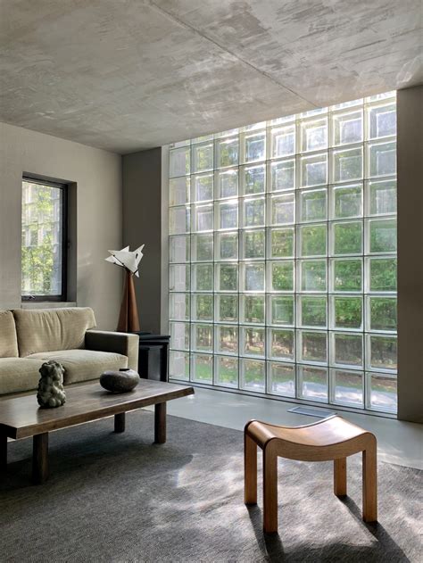 15 On Trend Glass Block Window Ideas To Use In Your Home Concrete Interiors House Design