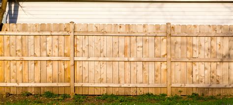 How to Install Wood Fence Panels | DoItYourself.com