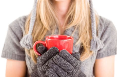 Premium Photo Happy Blonde In Winter Clothes Holding Mug