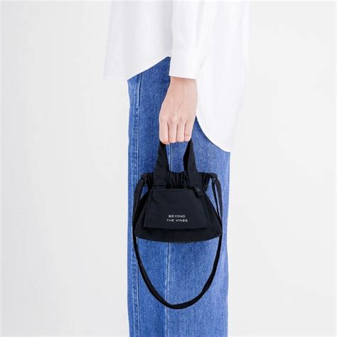 Beyond The Vines Micro Dumpling Bag In The Shade Black Luxury Bags And Wallets On Carousell