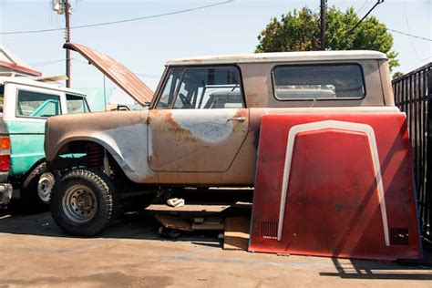 Premium Photo Abandoned Vintage Car Parked On Road