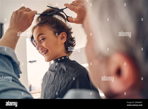 Little Cutie Boy Looking Curiously At Man Stock Photo Alamy