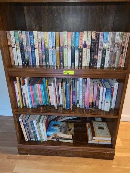 Contents Of Books On Shelf In Basement Ness Bros Realtors Auctioneers