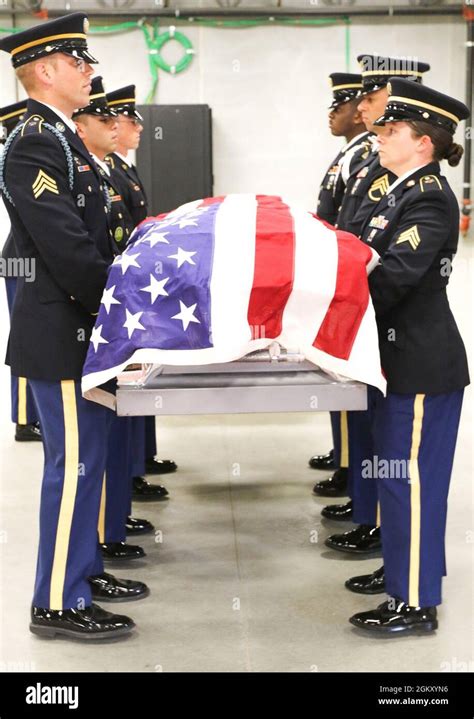 Six Soldiers Practice Carrying A Casket During The Intensive Army