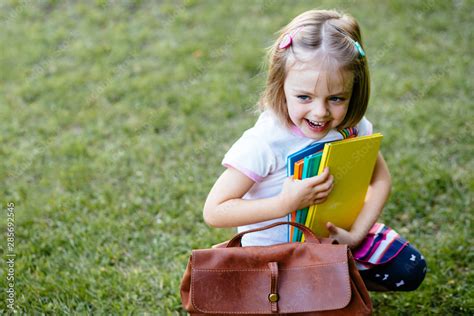 Cute Cheerful Lovely Adorable Little Preschholer Girl Pupil Of Prymary