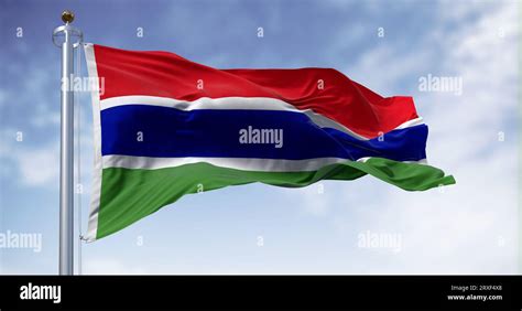 National Flag Of The Gambia Waving In The Wind On A Clear Day Three