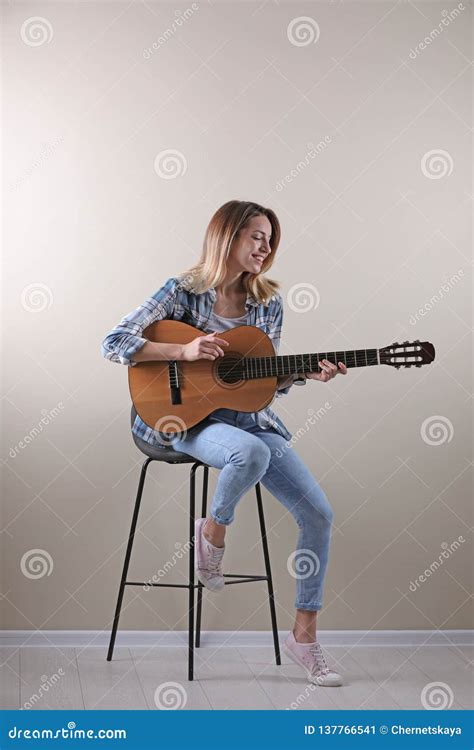 Young Woman Playing Acoustic Guitar Stock Image - Image of acustic ...