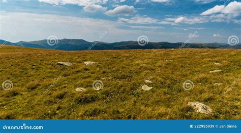 Zanoaga Meadow At The Foot Of Piatra Craiului Mountain Romania Royalty