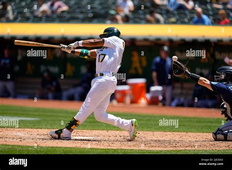 Oakland Athletics Infielder Elvis Andrus (17) at bat during an MLB game between Seattle Mariners ...