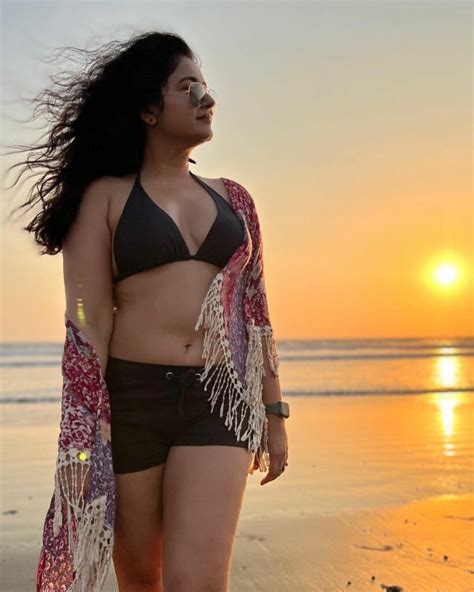 Poonam Maximises Hotness In Black Bikini