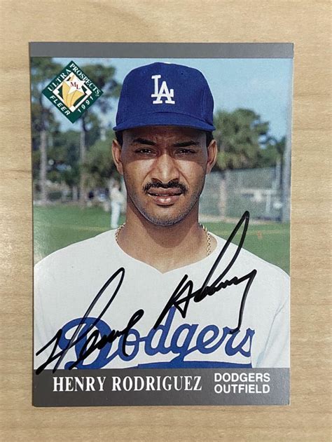 HENRY RODRIGUEZ LOS ANGELES DODGERS SIGNED 1991 FLEER CARD 386 W COA