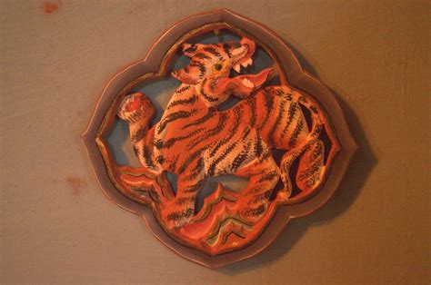 Traditional bhutanese wood carving of the tiger. | Mandala Collections ...