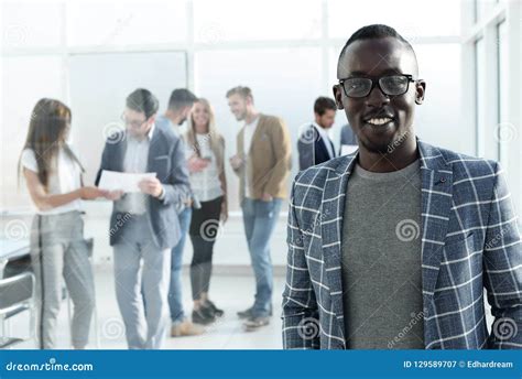 Businessman Standing in the Hall of the Modern Office Stock Image ...