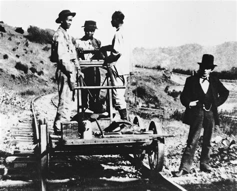 Chinese Laborers On A Handcar During Construction Of The Central
