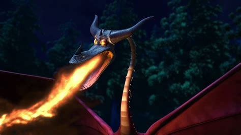 An Animated Dragon With Its Mouth Open And Glowing Fire Coming Out Of