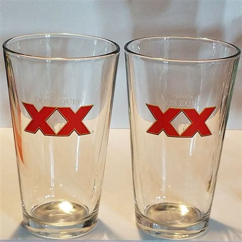 Lot Of 2 Dos Equis Beer Glasses 16 Oz Xx White Center Logo Ebay