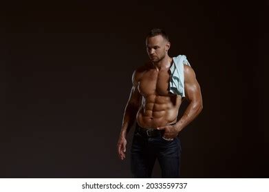 Male Muscular Athlete Sitting On Cube Stock Photo Shutterstock