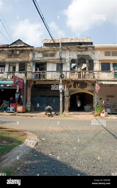 An Old Rundown Colonial Era Building Is Part Of The Urban Landscape In