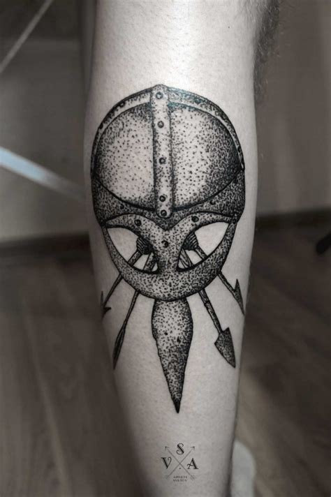 Viking helmet tattoo by Andrei Svetov - Tattoogrid.net