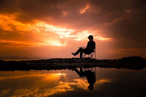 HD Wallpaper Photo Of Man Sitting On Camping Chair During Dawn Clouds