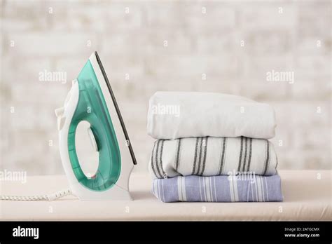 Modern Iron And Laundry On Board In Room Stock Photo Alamy