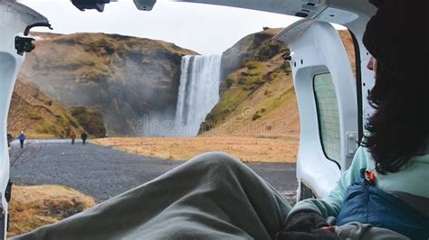 Tourist Woman Sit Hold Cup Enjoy Nature Views With Open Door Inside