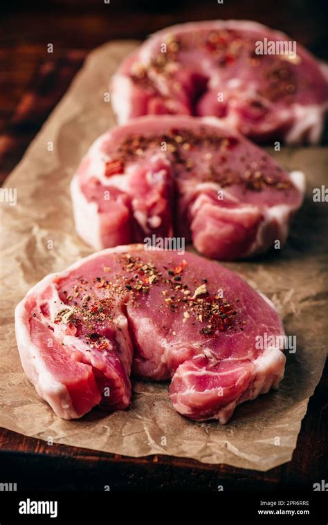 Pork Loin Steaks With Ground Spices Stock Photo Alamy