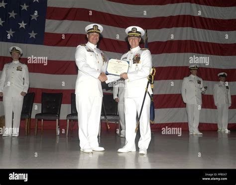 Santa Rita Guam Aug 17 2018 Rear Adm Daryl Caudle Right