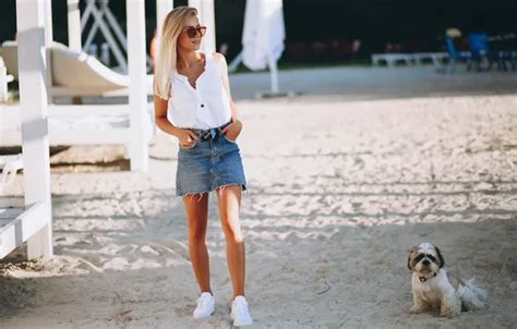 Обои girl dog beauty blonde sneakers denim miniskirt glamorous