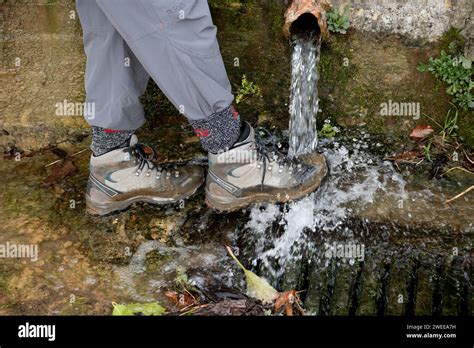 Washing Mud Off Boots Hi Res Stock Photography And Images Alamy