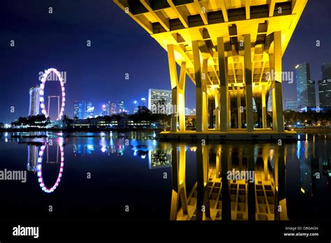 Singapore city and bridge at night Stock Photo - Alamy