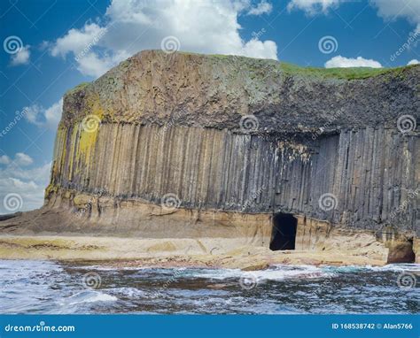 Columns Of Jointed Volcanic Basalt Rocks On The Island Of Staffa In The