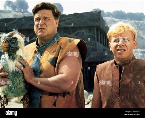 RICK MORANIS, JOHN GOODMAN, THE FLINTSTONES, 1994 Stock Photo - Alamy