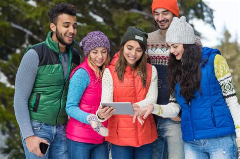 People Group Using Smart Phone Snow Forest Happy Smiling Young Friends