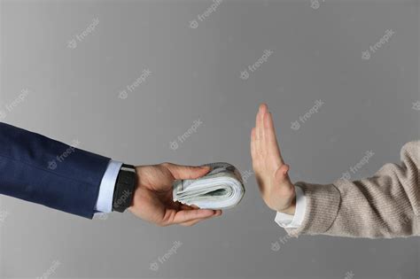 Premium Photo Woman Refusing To Take Bribe On Grey Background Closeup