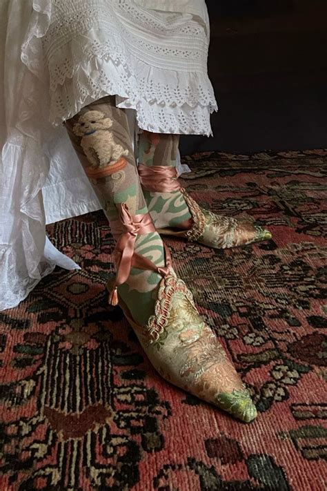 Close Up Of Feet Clad In Elegant Silk Brocade Flat Shoes In Shimmering