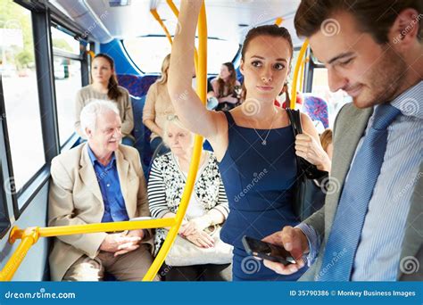 Passengers Standing On Busy Commuter Bus Royalty Free Stock Image