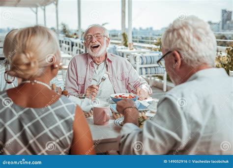 Positive Delighted Mature Man Laughing At Joke Stock Photo Image Of