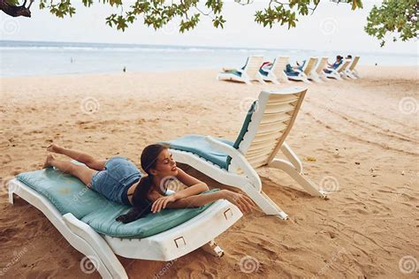 Lifestyle Woman Beach Resort Lying Sunbed Caucasian Sand Ocean Smiling